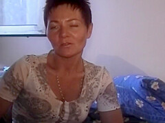 Short Haired German Lady Pleasing Her Hairy Muff With A Dildo