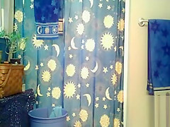 Skinny girl with sexy little tits takes a shower