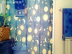 Skinny girl with sexy little tits takes a shower