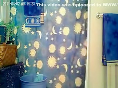 Skinny girl with sexy little tits takes a shower