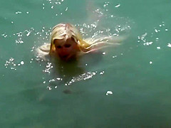 Slim blonde gets fucked with her boyfriend at a public beach