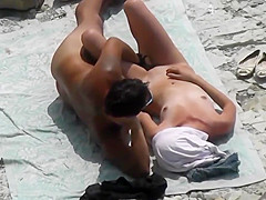 Slim blonde gets fucked with her boyfriend at a public beach