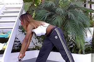 Sporty ebony shemale gets her ass toyed