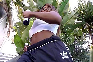 Sporty ebony shemale gets her ass toyed
