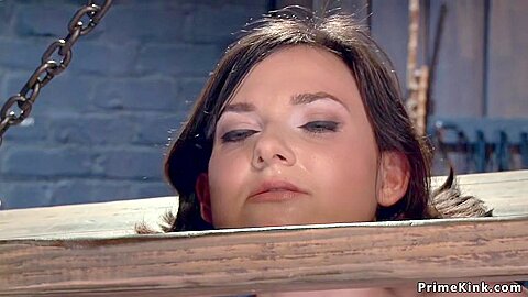 Strapped Brunette Slave Is Toyed