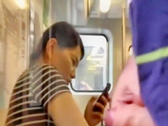 Stroking his small penis on the train