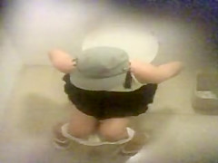 Three girls caught pissing in a public wc