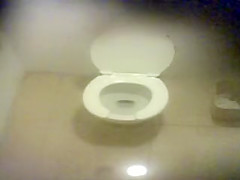 Three girls caught pissing in a public wc