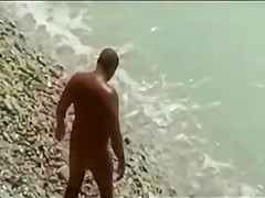 Threesome sex fun on public beach caught on cam