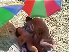 Threesome sex fun on public beach caught on cam