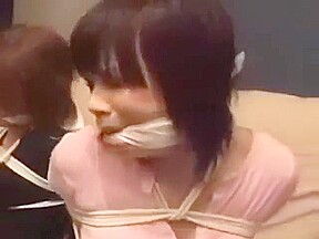 Tied girls trying to escape