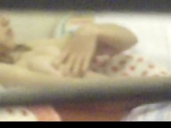 Trough window-teen 18+ masturbates on bed