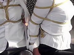 Two Asian Beauties Bound In Leather Pants