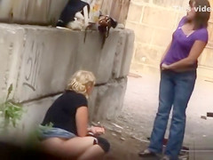Two Ukrainian girls caught peeing outdoors