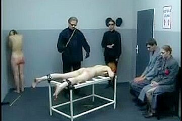 Two hot teens 18+ getting caned hard on the torture bench