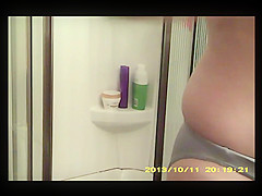 Unaware wife's bottom half before and after shower