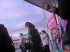 Upskirt porn with brunette-hair gal in a public place
