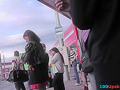Upskirt porn with brunette-hair gal in a public place