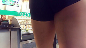 Volleyball player's deliciously round ass in line