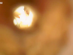 Voyuer young woman in changing room