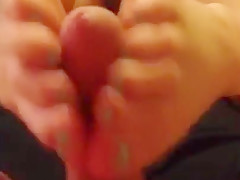 Wife gives husband foot job and he cums all over her Toes!!!