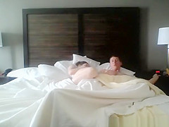 Wife rides her man's cock in bed