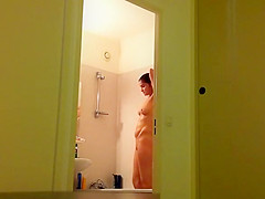 Woman caught in bathroom drying her body