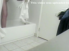 Woman spied after shower dressing