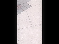 Woman with hot ass and legs in mini skirt and high heels