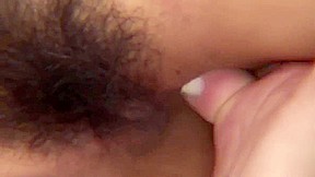 Young beauty gets her hairy bush teased with toys