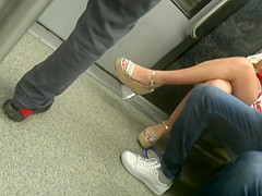 Young brunette, sexy legs in wedges heels