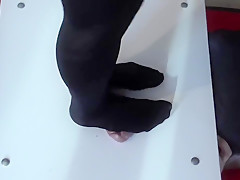 cruel full weight trampling on cock and balls in black pantyhose