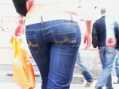 lovely street candid tight ass in jeans wriggling down the street