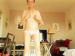nude wearing pink string with pearls