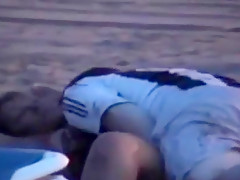 tapes a dude with soccer shirt fucking a partyslut at the beach