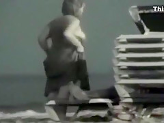 tapes a dude with soccer shirt fucking a partyslut at the beach