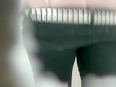 uses peephole to film woman pissing