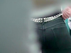 uses peephole to film woman pissing