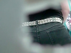 uses peephole to film woman pissing